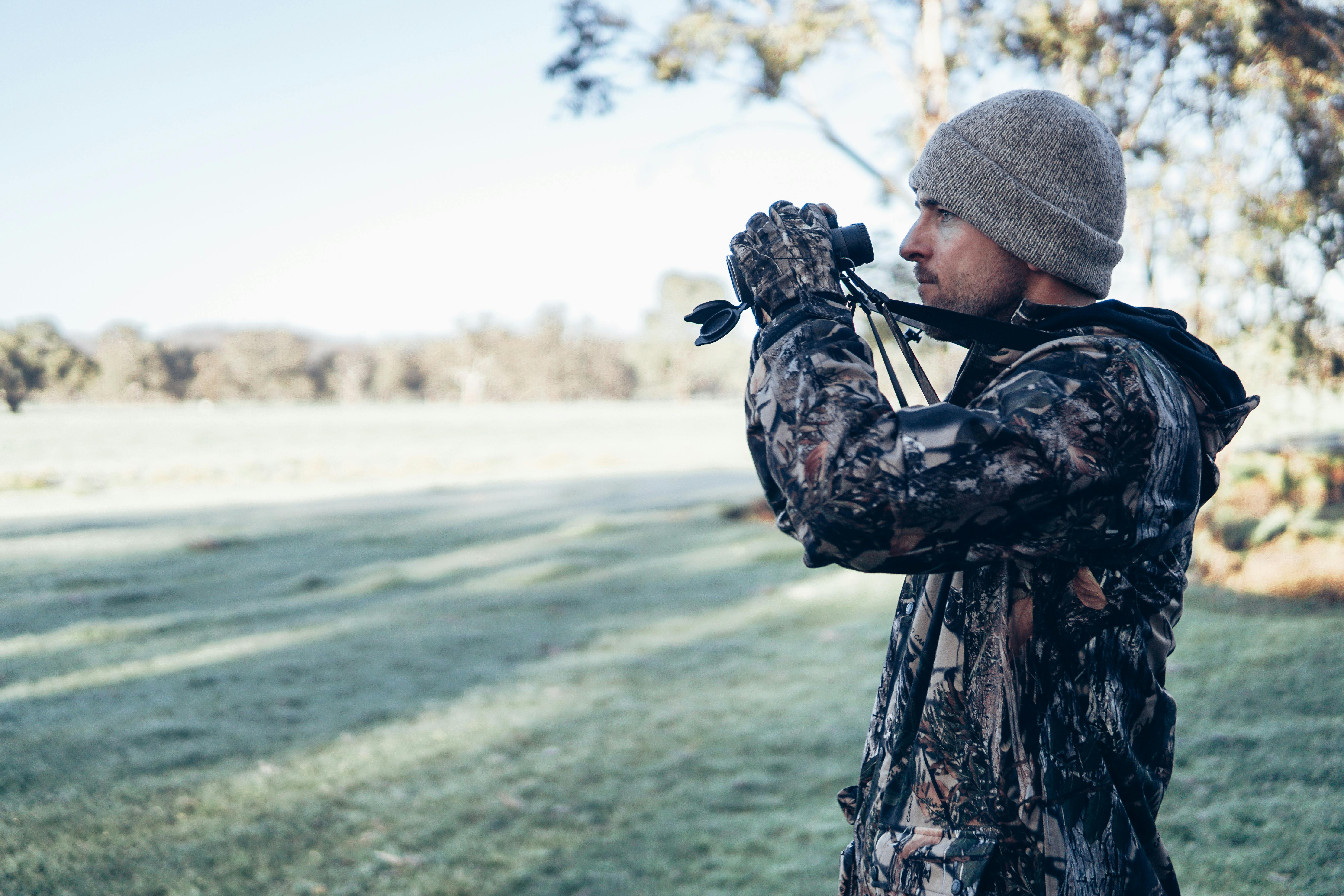 outdoorsman with binoculars