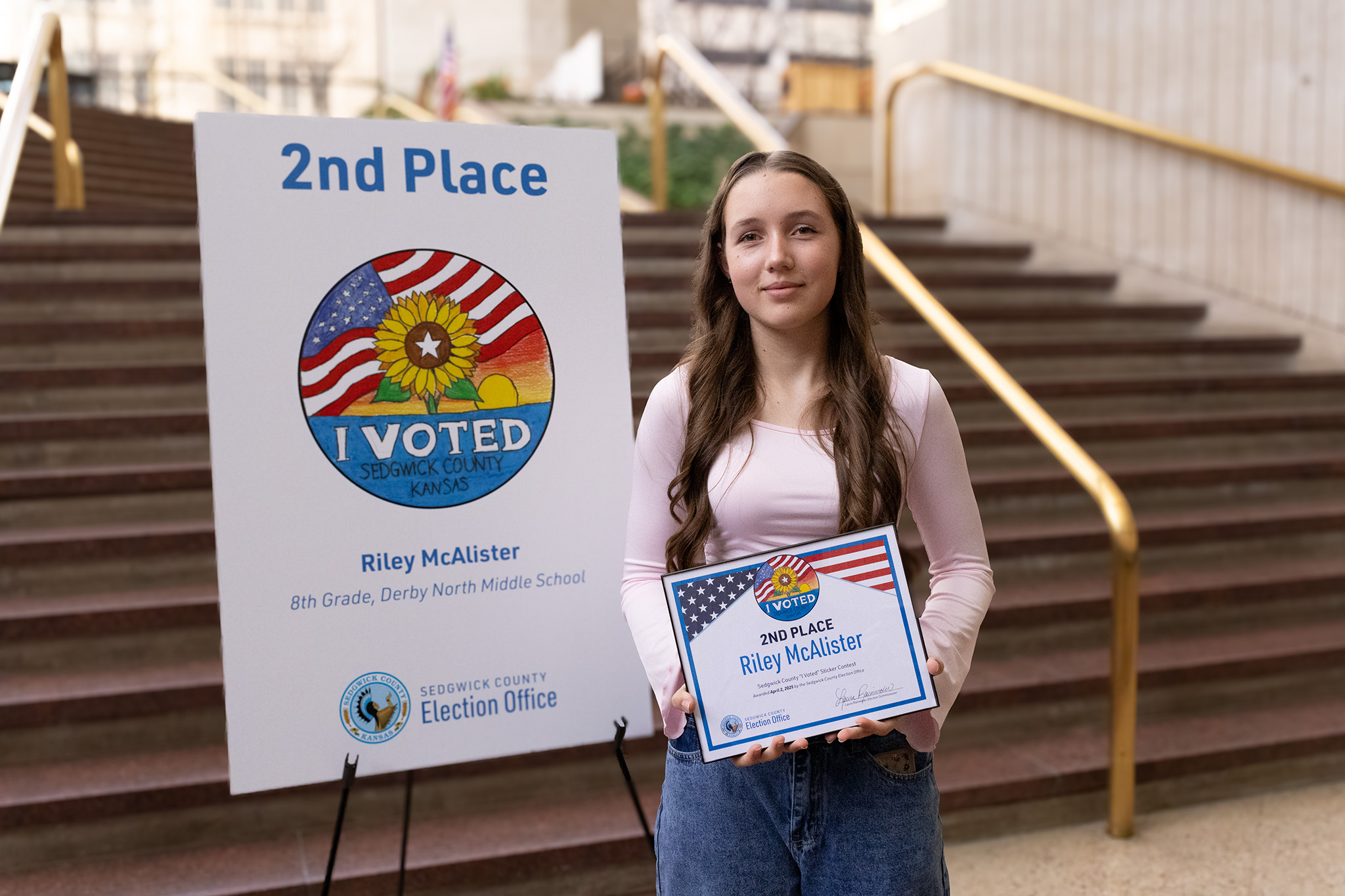 2nd Place Winner holding Artwork