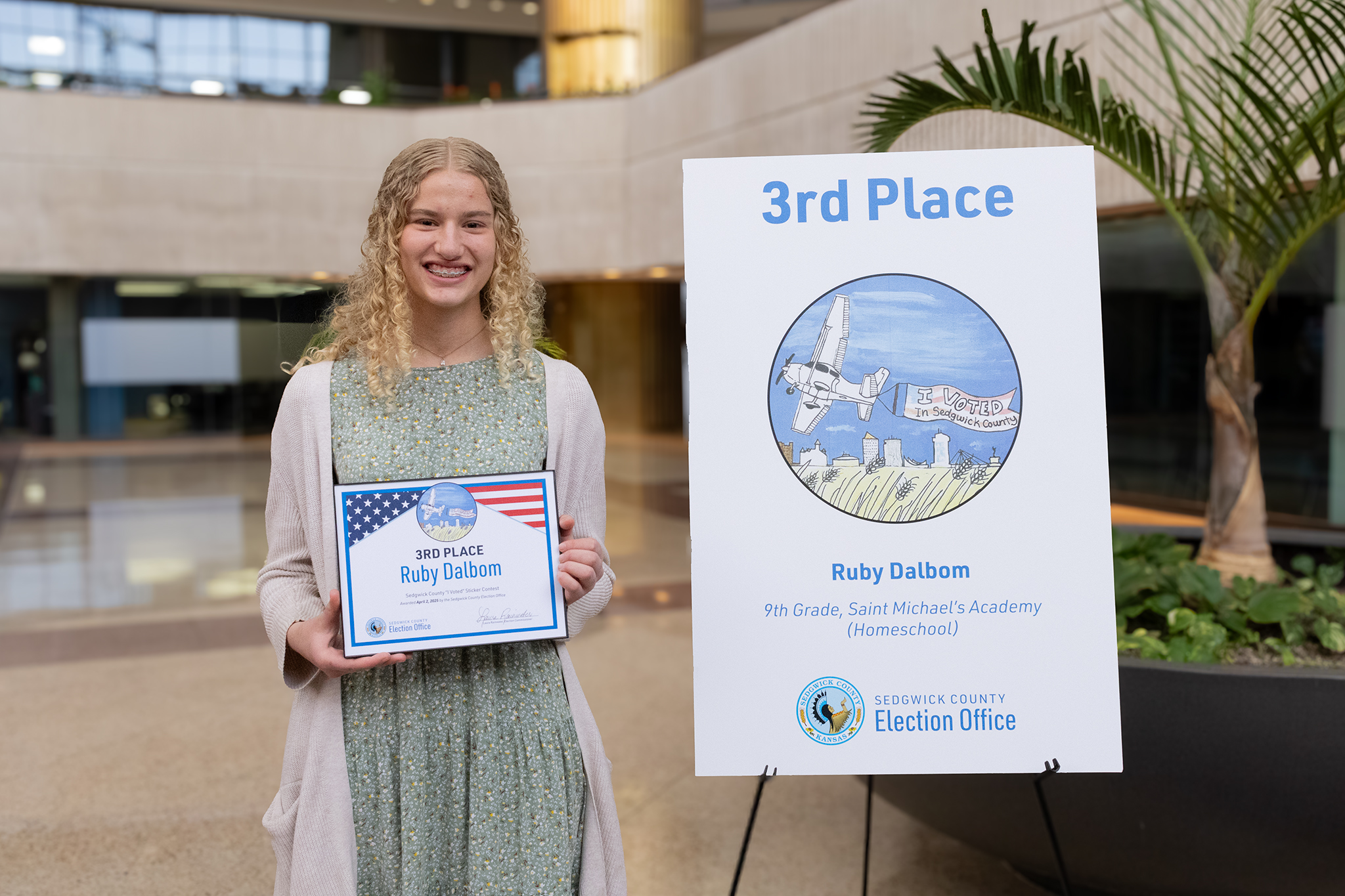 3rd Place Winner holding Artwork